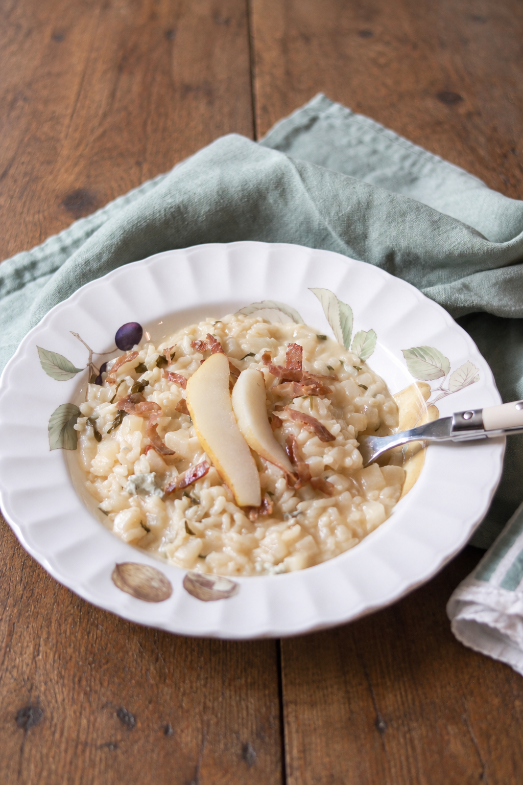 Risotto alla rucola e speck con stracchino e pera